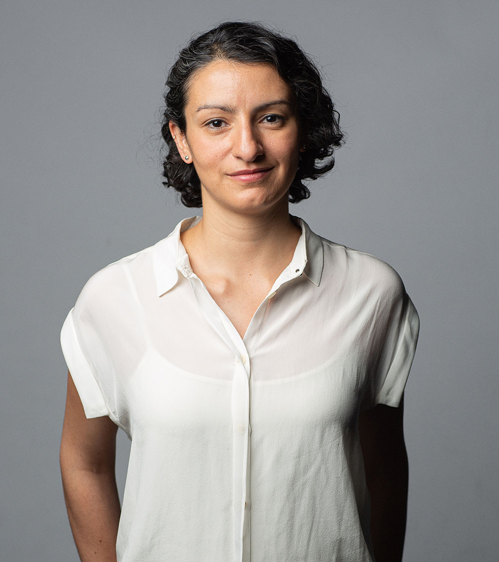 Elena Tudela in a white blouse