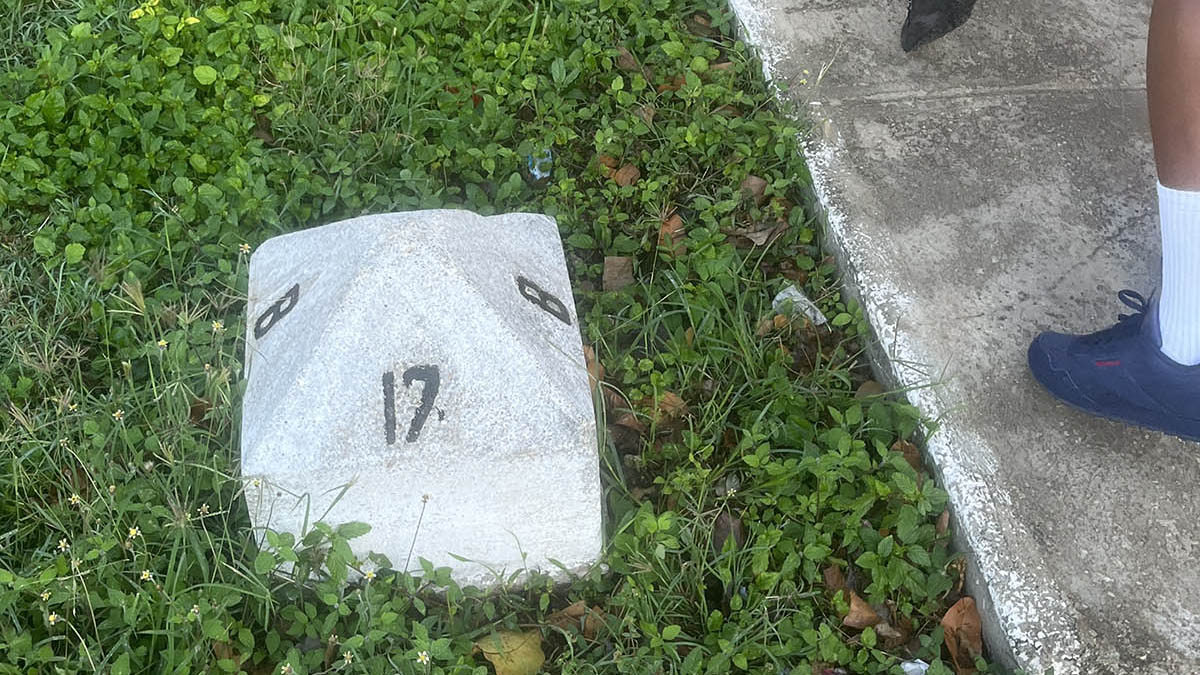 Cinderblock street sign. 