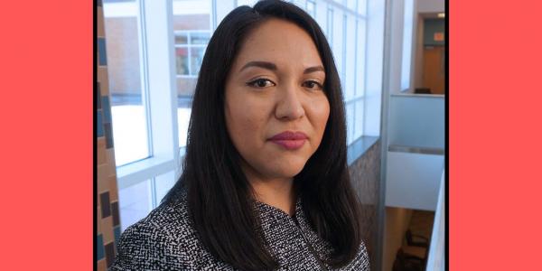 Dr. Perla Guerrero headshot with pink background