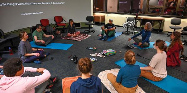 People gathered in a meditation circle.