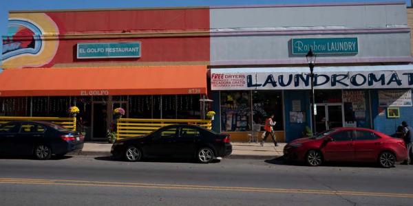 A street-side restaurant and laundromat 