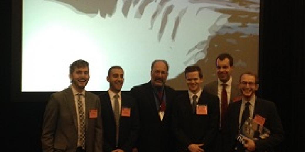 Team members celebrate after accepting the grand prize at the CNU Congress in Buffalo, NY.