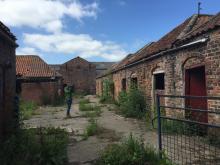 A student surveys a Victorian era farmstead at the Forest, one of the tenant farms that used to be part of Kiplin but was sold off in 1919.