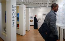 A priest and attendee at the Holodomor Memorial Kibel Gallery Exhibit