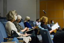 Marking Loss, Making Memories Symposium panelists and dean in auditorium