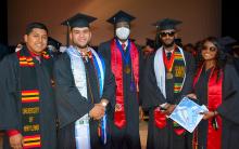 Spring 2022 Commencement students posing with sunglasses.