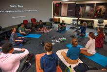 People gathered in a meditation circle.