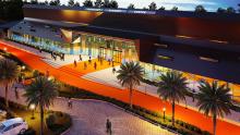 Transcorp Banquet Center with large stained glass windows and an orange walkway