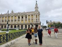 Students and faculty in front of a building in Havana, Cuba