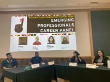 Panelists sitting in front of a presentation for Emerging Professions Career Panel