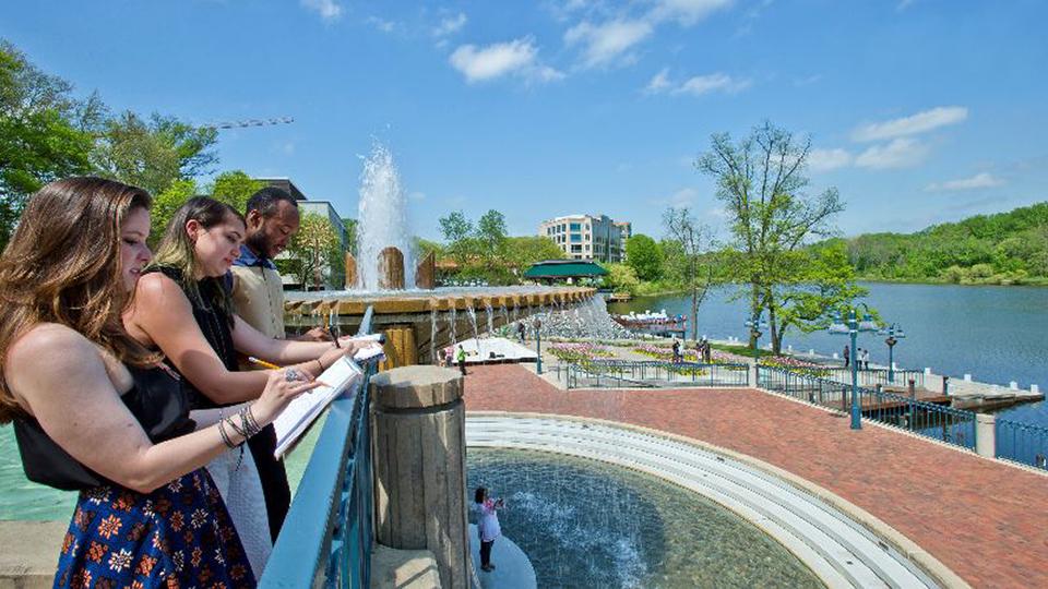 Students Sketch Near a Fountain