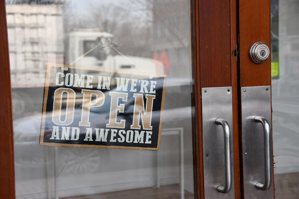 Open sign at Nubian Hueman store