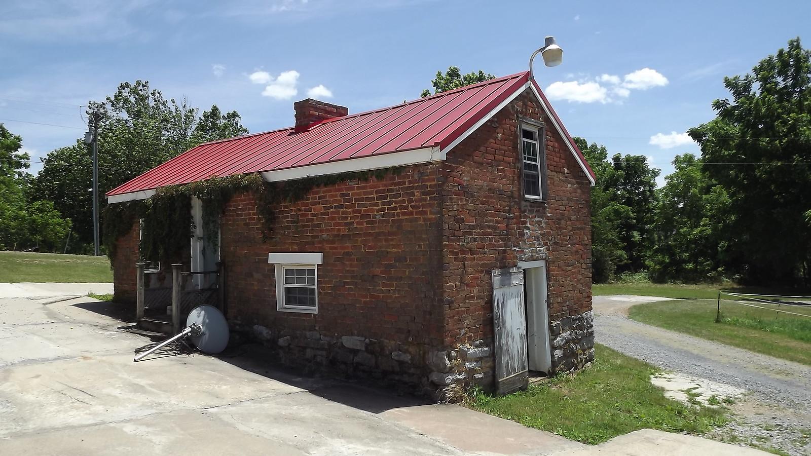 Click for more information about Brown Patterson Brick Outbuilding