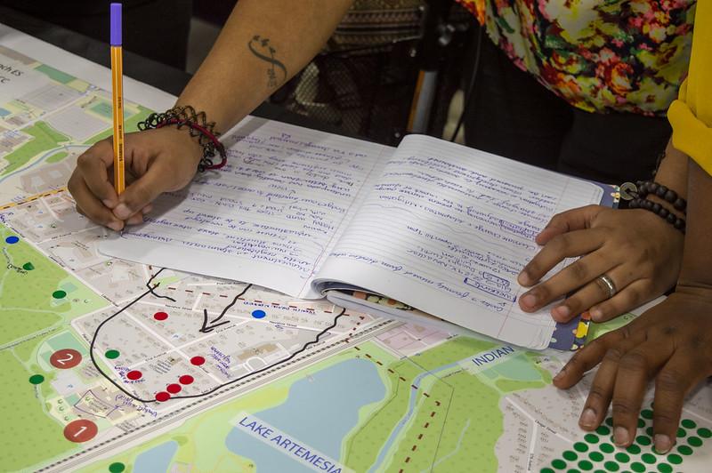 Closeup of people working on Lakeland map