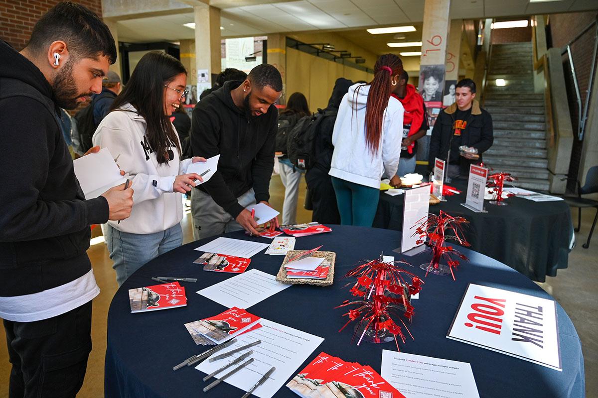 Students writing thank you notes on Giving Day 2023