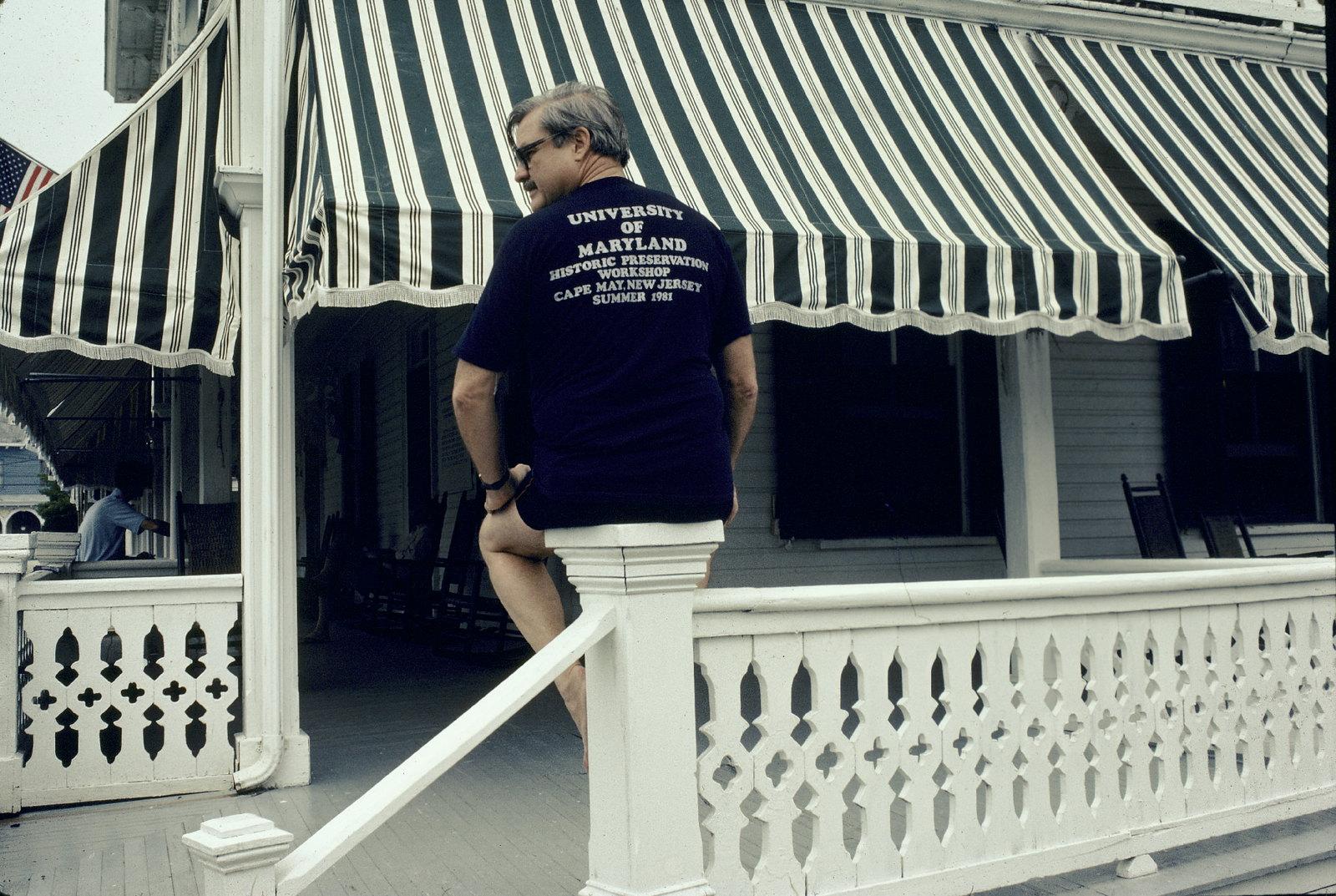 David Fogle sitting on the Chalafonte deck, his back to the camera